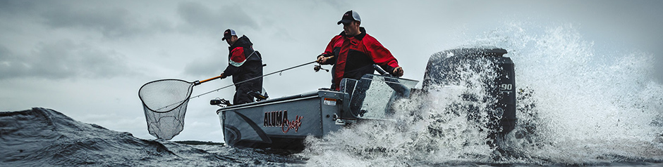2017 two men fishing in their boat at sea.